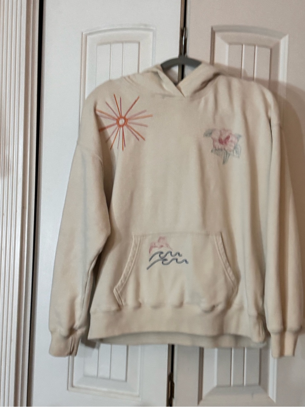 Hollister Cream Hoodie Sweater with Pastel Embroidered Sun & Floral Motifs